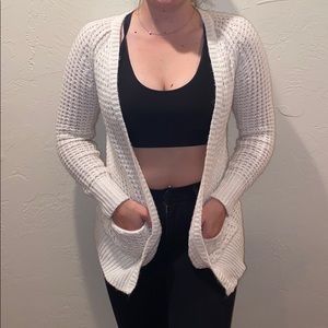 white knit cardigan with pockets